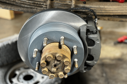 Diesel Maintenance Tips from Branch Automotive in Littleton, CO. Image of diesel truck brakes coming in for brake maintenance due to grinding.