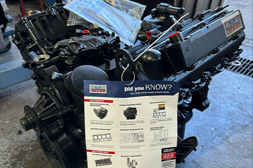 Power Stroke Engine in Littleton and Highlands Ranch, CO with Branch Automotive. Image of brand new Ford Power Stroke diesel engine for 6.0 ford that will be installed in a truck in the shop.