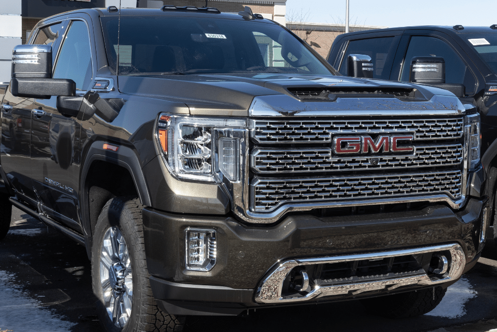 duramax repair, diesel repair in Littleton, CO at Branch Automotive. An image of a black GMC truck parked outside.